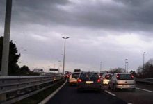 maltempo Puglia allerta rossa con strada allagata e pioggia intensa